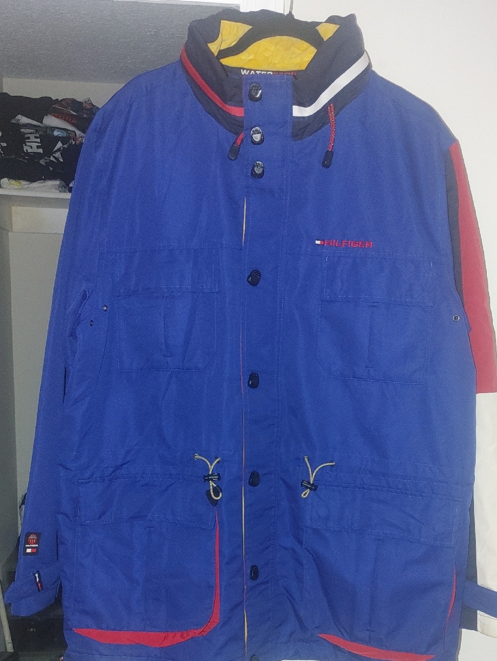 Tommy Hilfiger Blue Raincoat with Red and White Trim